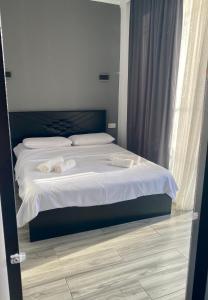 Letto o letti in una camera di Hotel Niko
