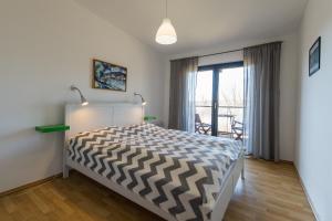 Letto o letti in una camera di Lipno 35 - Lipno In