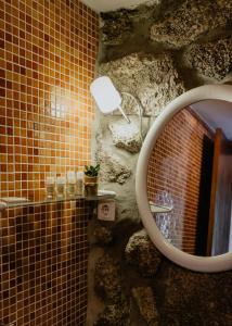 Ett badrum på Casas da Peneda - Geres