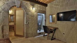 TV a/nebo společenská místnost v ubytování Nox Cave Hotel Special Class