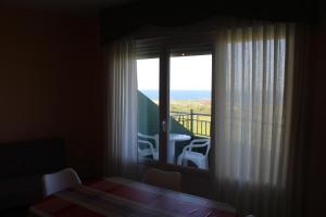 Posteľ alebo postele v izbe v ubytovaní Apartamentos Los Gemelos + 34 fotografií