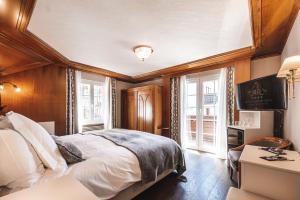 Voodi või voodid majutusasutuse Boutique Hotel Albana Real - Restaurants & Spa toas