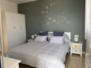 Posteľ alebo postele v izbe v ubytovaní Apartamento Calypso Inmomart