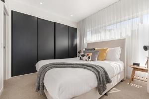 Voodi või voodid majutusasutuse Luxury 5-floor Unit with Ocean Views near Beach toas