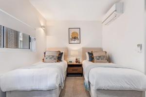 Voodi või voodid majutusasutuse Luxury 5-floor Unit with Ocean Views near Beach toas