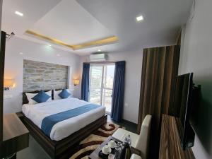 Postel nebo postele na pokoji v ubytování Chautari Boutique Hotel