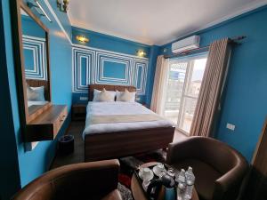 Postel nebo postele na pokoji v ubytování Chautari Boutique Hotel