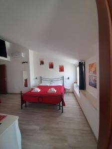 Postel nebo postele na pokoji v ubytování Cuscino e Cappuccino B&B
