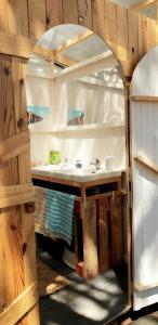 A kitchen or kitchenette at The PineForest Cabin