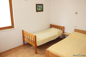 Posteľ alebo postele v izbe v ubytovaní Apartment in Pisak with sea view, terrace, air conditioning, Wi-Fi (4722-5)