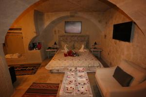 Postel nebo postele na pokoji v ubytování Nox Cave Hotel Special Class