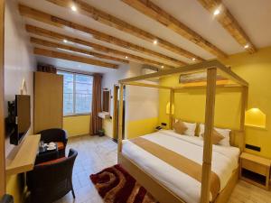 Postel nebo postele na pokoji v ubytování Chautari Boutique Hotel