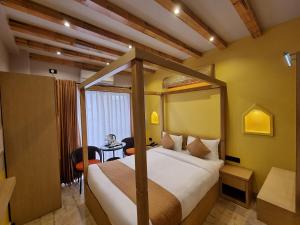 Postel nebo postele na pokoji v ubytování Chautari Boutique Hotel