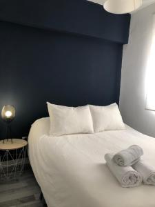 Кровать или кровати в номере Apartamento Algazul