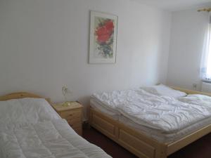 Giường trong phòng chung tại Ferienhaus Weise