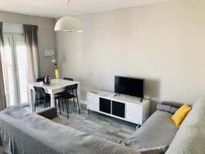 Televisyen dan/atau pusat hiburan di Apartamento Algazul