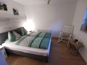 A bed or beds in a room at Ferienwohnung Magdalena