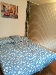 Posteľ alebo postele v izbe v ubytovaní Vámház Apartman