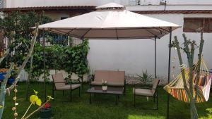 A garden outside Fyllou Apartment Asprovalta