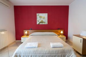 Postel nebo postele na pokoji v ubytování Hotel D'Atri + 37 fotografií