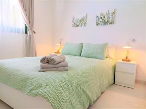 Postel nebo postele na pokoji v ubytování Casa Contento by Sea You There Fuerteventura