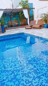 The swimming pool at or close to Hotel Casarão Pitangueiras