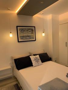 Postel nebo postele na pokoji v ubytování Apartments Lota