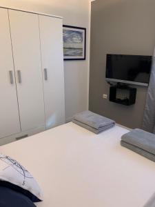 Postel nebo postele na pokoji v ubytování Apartments Lota