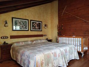 Postel nebo postele na pokoji v ubytování Asturias Apartamentos Rurales Naveces