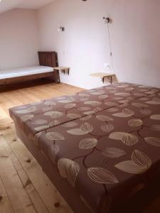 
Posteľ alebo postele v izbe v ubytovaní Penzión Thamasy
