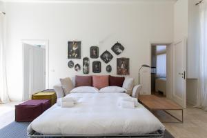 Posteľ alebo postele v izbe v ubytovaní Infinite House Guglie