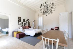 Posteľ alebo postele v izbe v ubytovaní Infinite House Guglie
