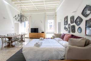 Posteľ alebo postele v izbe v ubytovaní Infinite House Guglie