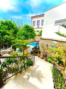 a view from the balcony of a house with a pool at Kaleici Hotel in Antalya