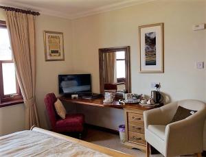 TV a/nebo společenská místnost v ubytování Ardno House B & B
