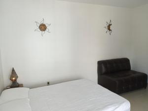 Postel nebo postele na pokoji v ubytování Milenio III B&B