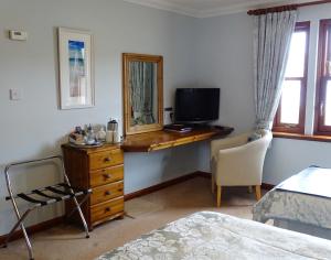 TV a/nebo společenská místnost v ubytování Ardno House B & B + 10 fotografií