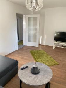 Μια τηλεόραση ή/και κέντρο ψυχαγωγίας στο Ferienwohnung Sonnenhang 3