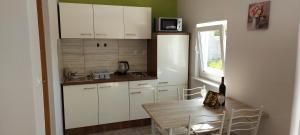 Köök või kööginurk majutusasutuses Studio Apartment Palmira