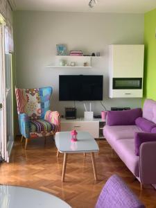 Гостиная зона в Family Apartment Green with a sea view and a free parking