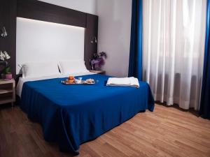 Postel nebo postele na pokoji v ubytování Hotel Louisiana