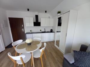 Kuchyňa alebo kuchynka v ubytovaní Apartamenty Asis