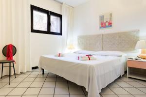 A bed or beds in a room at Villa Vanessa