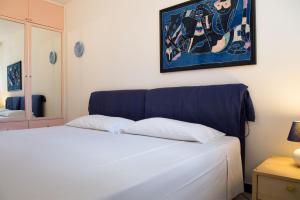 A bed or beds in a room at Villa Vanessa