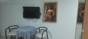 TV a/nebo společenská místnost v ubytování Hotel Villa Granada