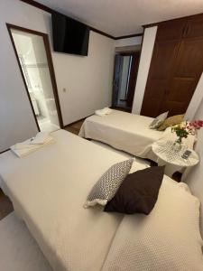 Uma cama ou camas num quarto em Casa da Cerca
