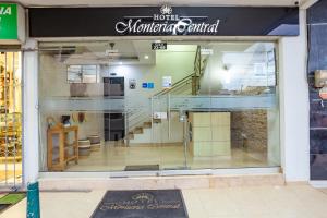 a store front window of a mountain central store at Hotel Ayenda Monteria Central in Montería