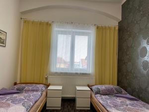 A bed or beds in a room at Četnická stanice Hluboká