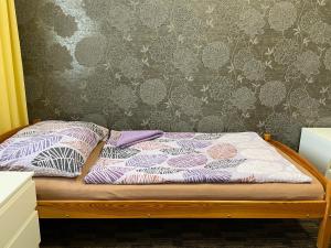 A bed or beds in a room at Četnická stanice Hluboká