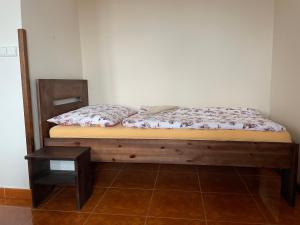 A bed or beds in a room at Četnická stanice Hluboká